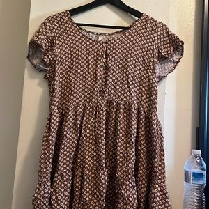 Floral babydoll dress. It fits loosely and looks good with a waist corset.